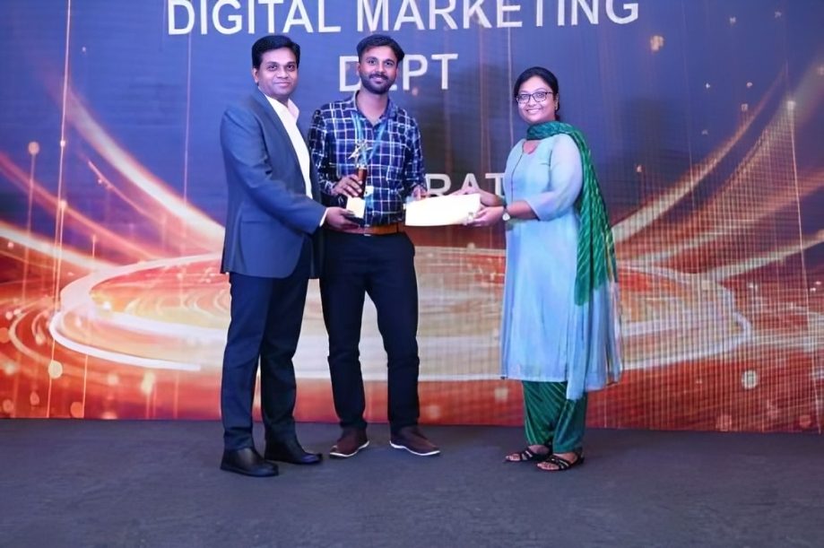 Prem Kumar receiving the Bright Spark — Top Performer of the Year 2024 award